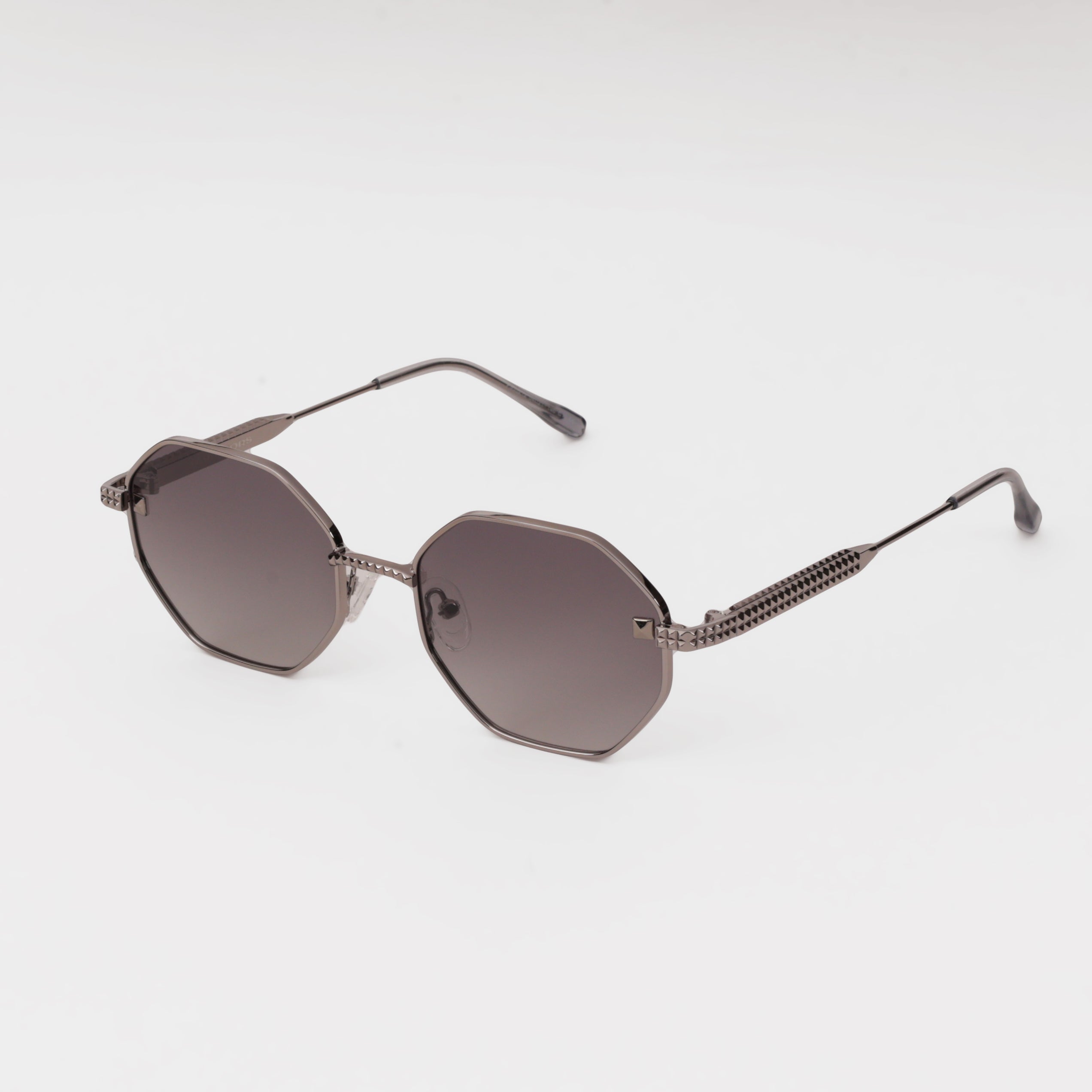 Sunglasses with a geometric frame on a white background