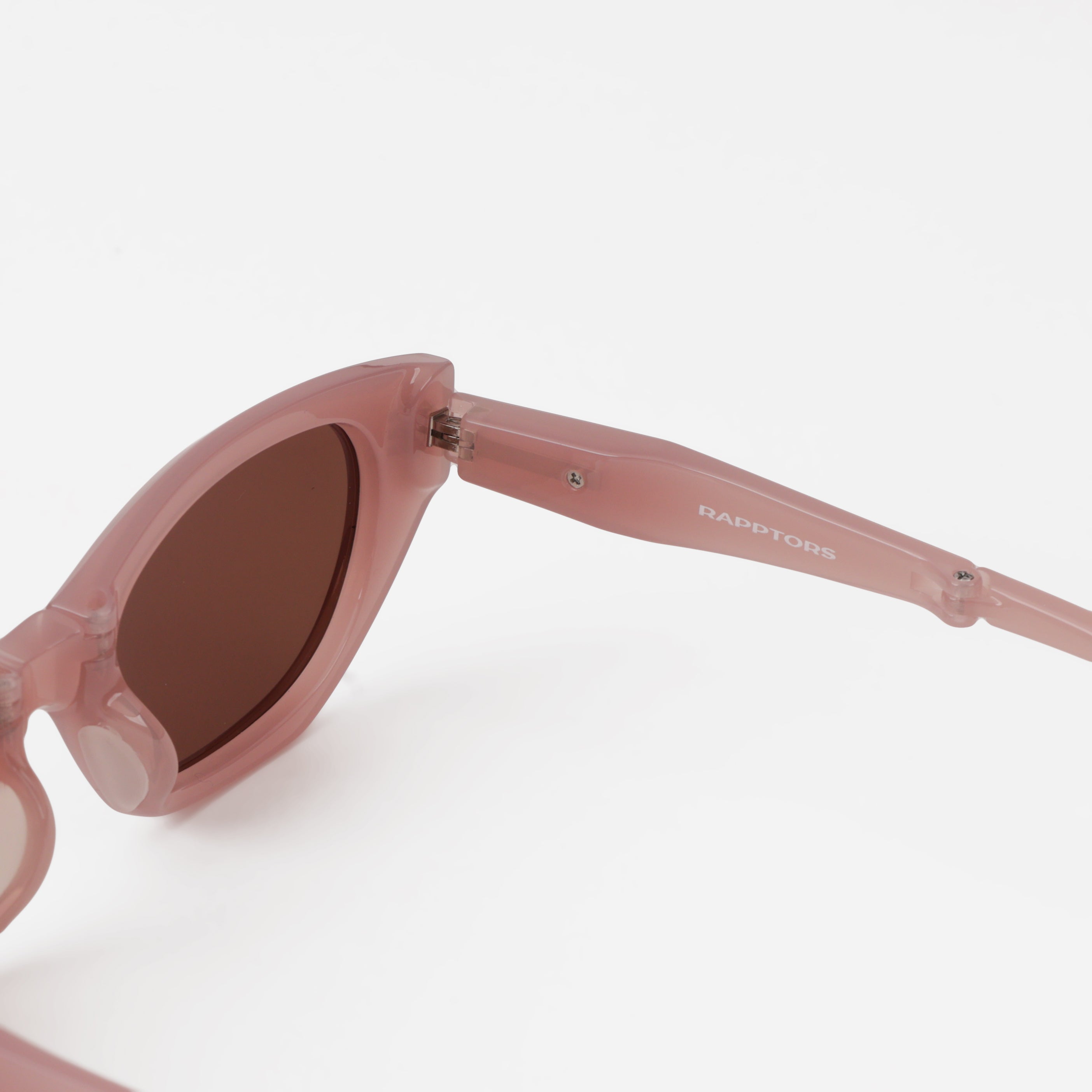 Pink sunglasses with a white background