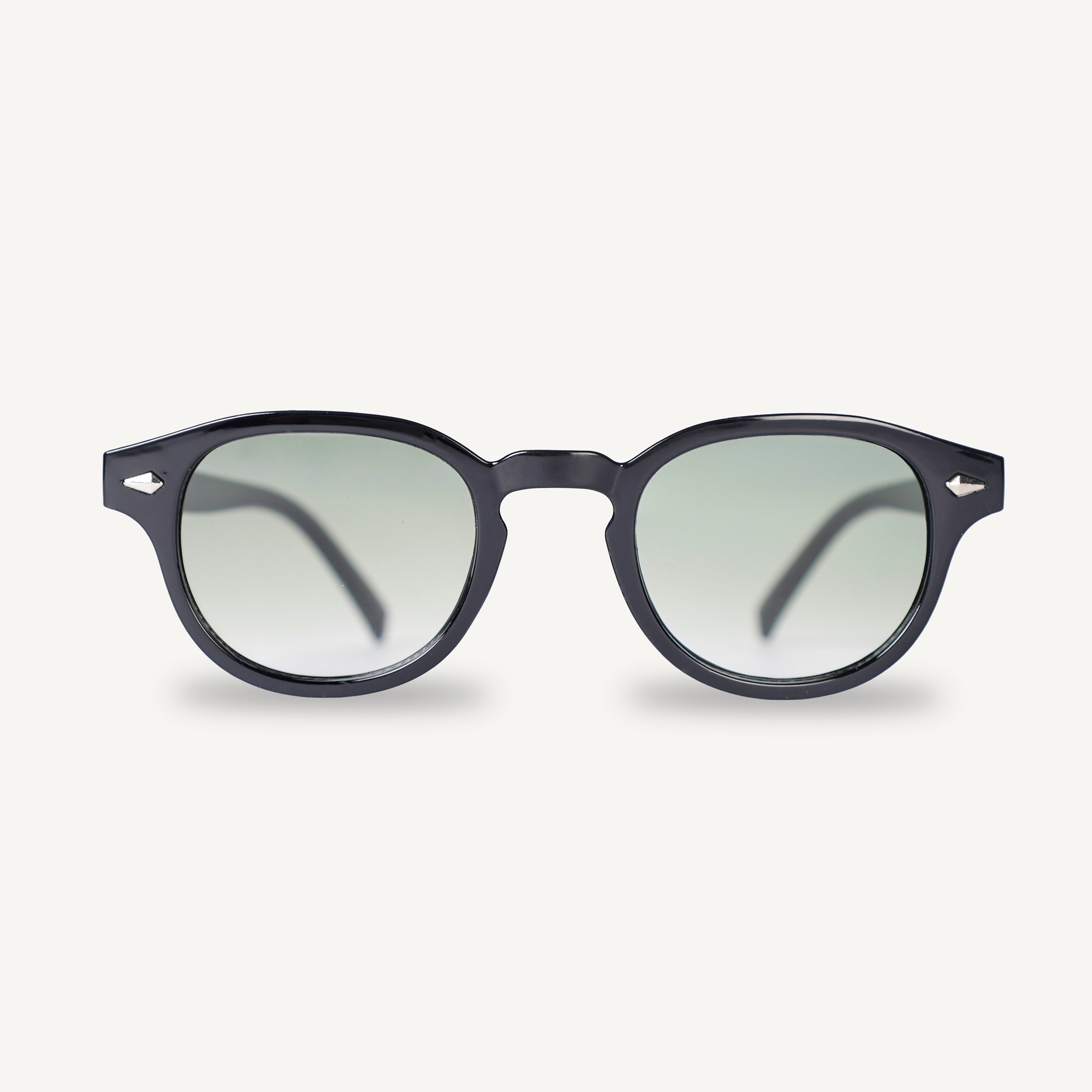 Black frame sunglasses with green gradient lenses on a white background