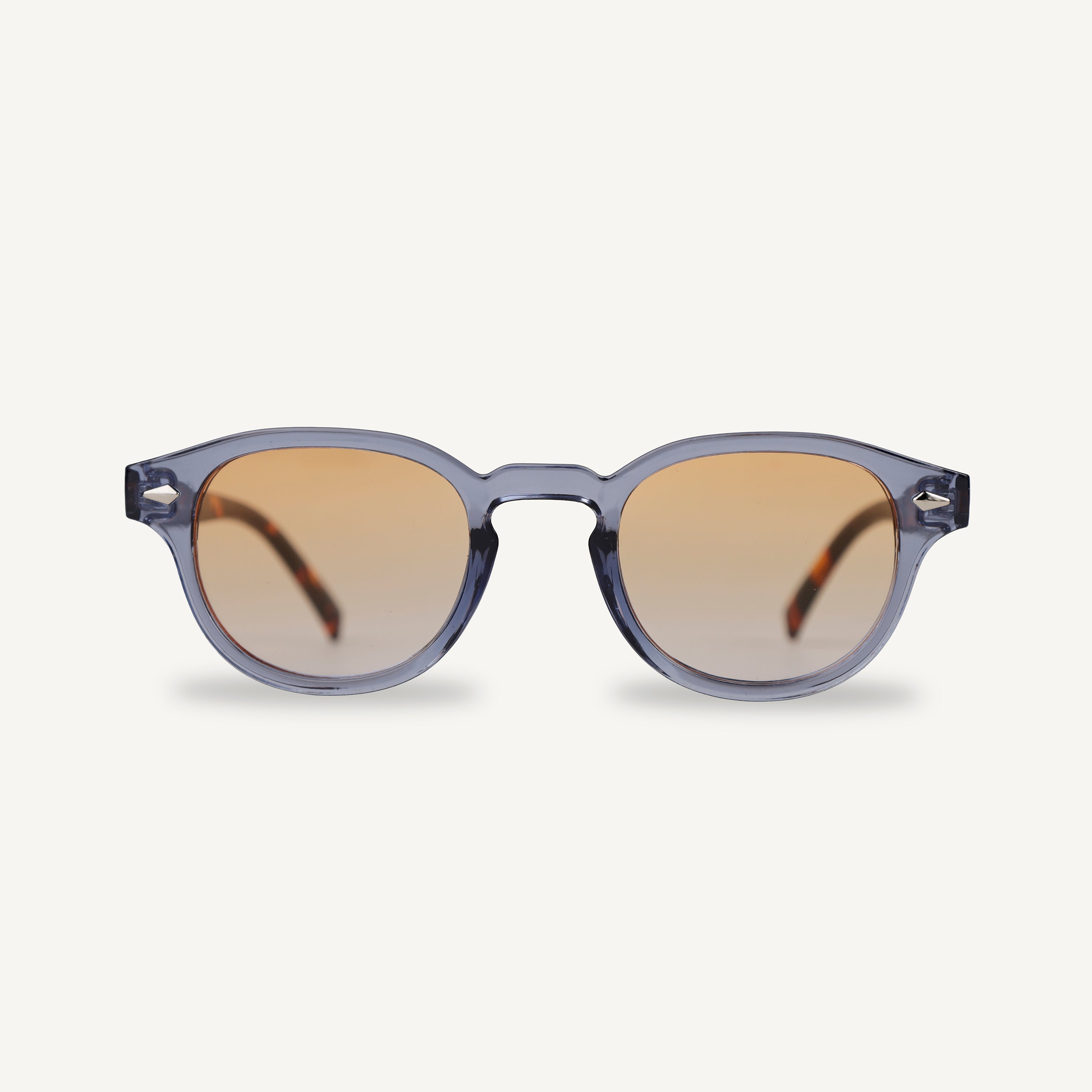 Blue and tortoise demi frame sunglasses with yellow gradient lenses on a white background