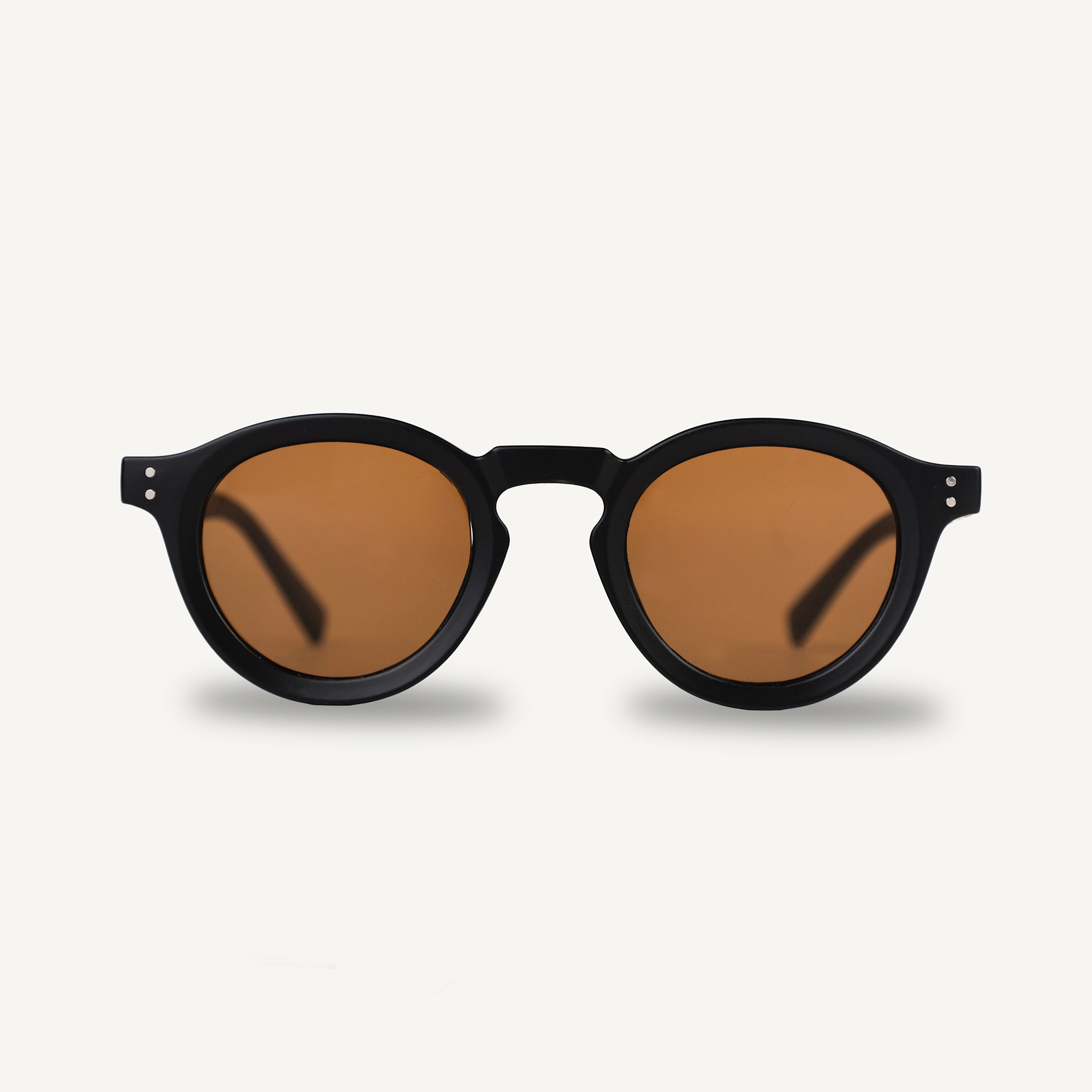 Matte black frame sunglasses with brown lenses on a white background